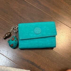 Kipling Teal Fold-Over Wallet with Monkey Charm